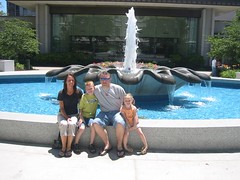 Family pic in front of water statue on Temple grounds