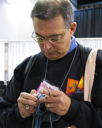 Robert Knitting a Tam, Stitches Midwest 2005