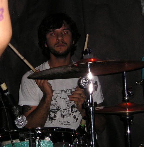 The drummer of Barnicle caught in a bored-looking pose